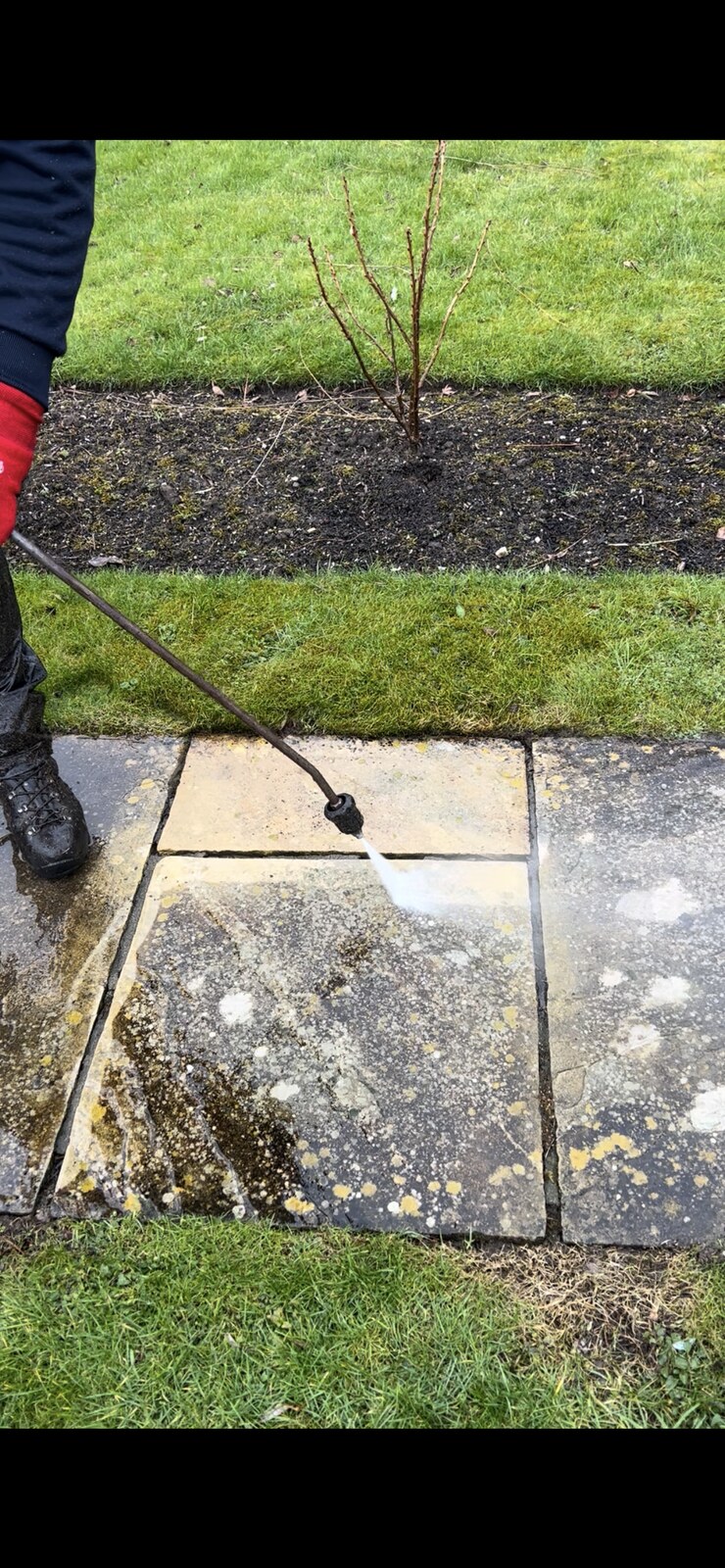 Patio pressure wash showing before and after results